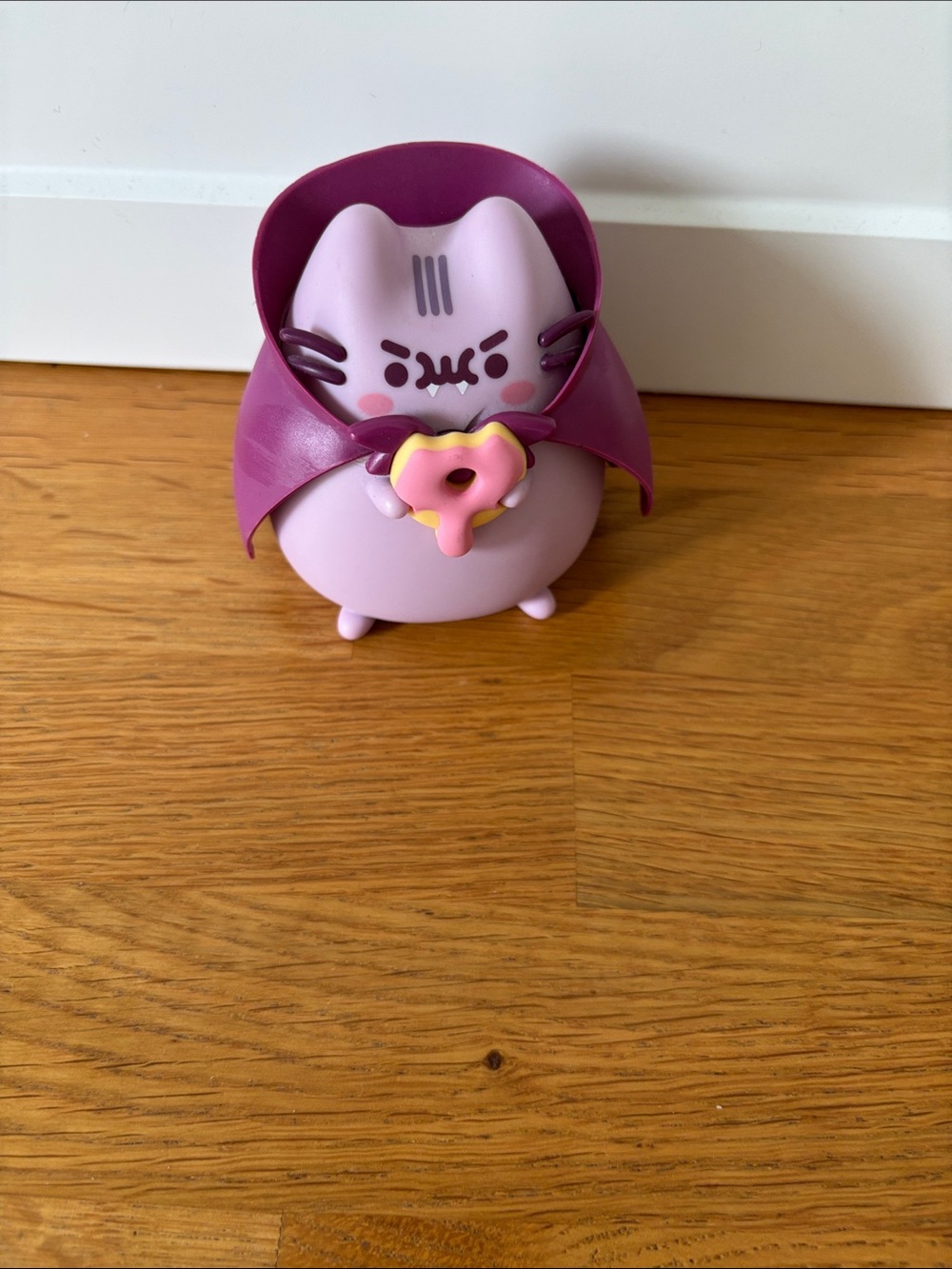 Pusheen Cute Lilac Cat Figurine Holding Donut - Purple Cape